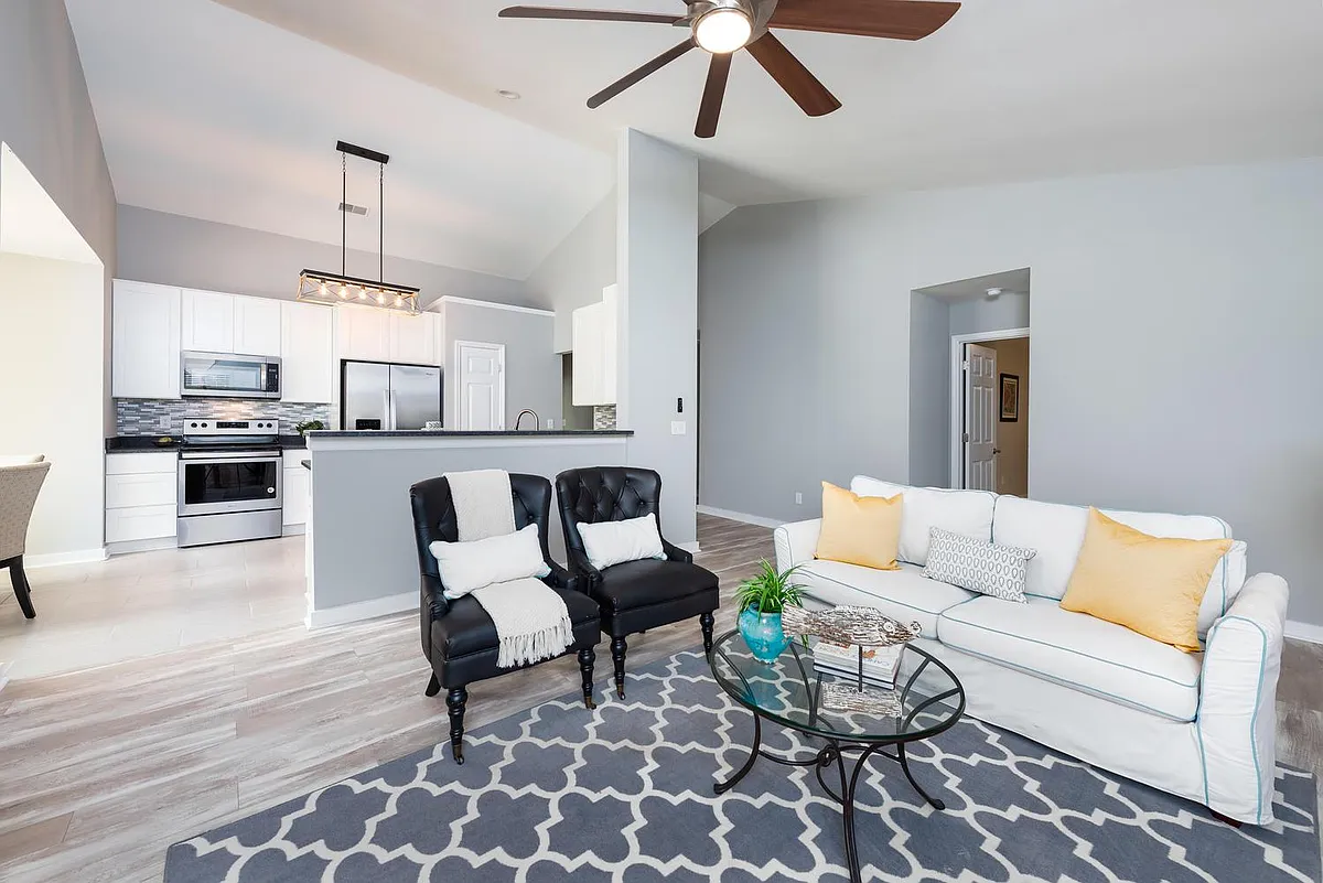 Open floorplan living, kitchen and dining - 2491 Cotton Creek Dr