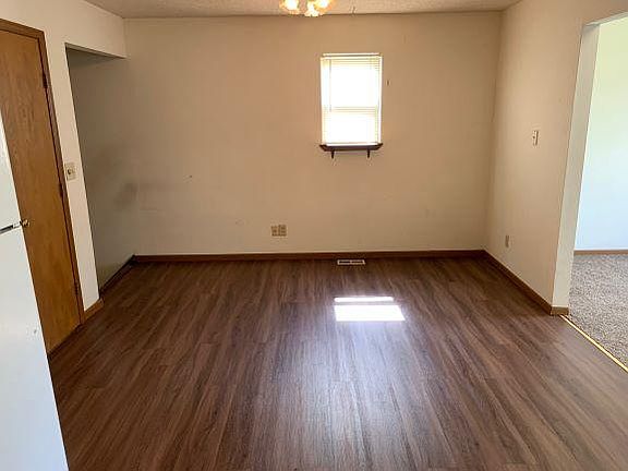 Eating area of country kitchen. Multipurpose closet on left by hall to bathroom/bdrm.