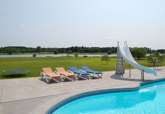 Relax by the pool or do a little boating