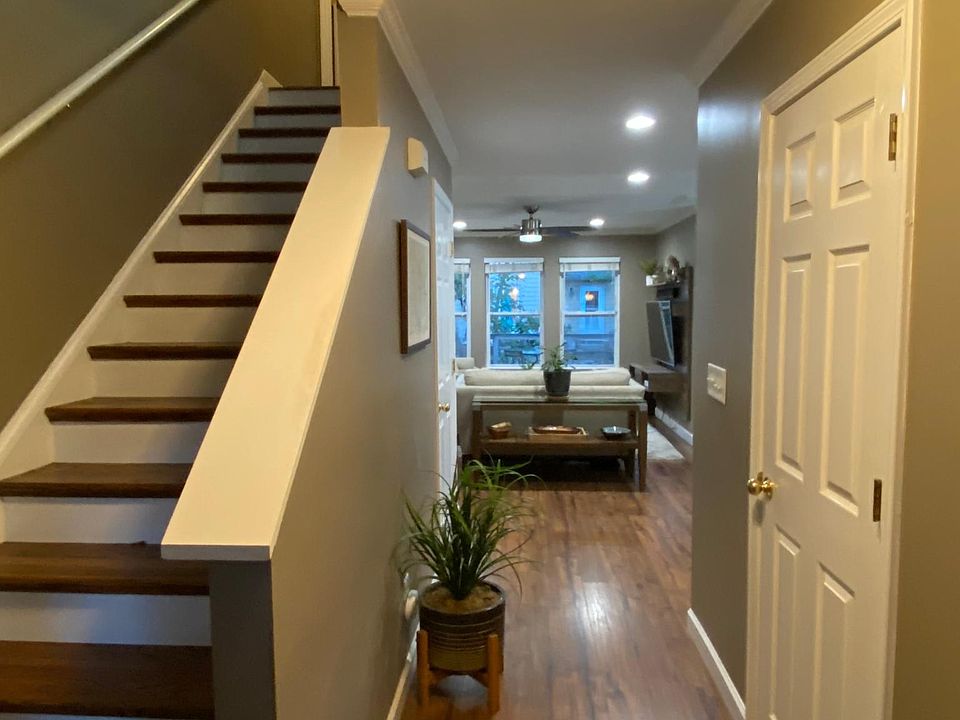 Foyer with spacious coat closet and half bath