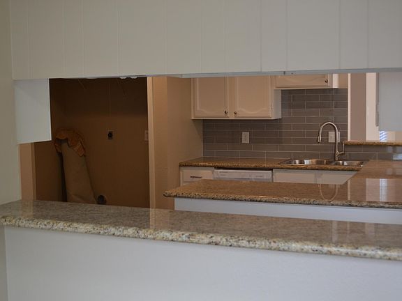 View of kitchen from breakfast/office