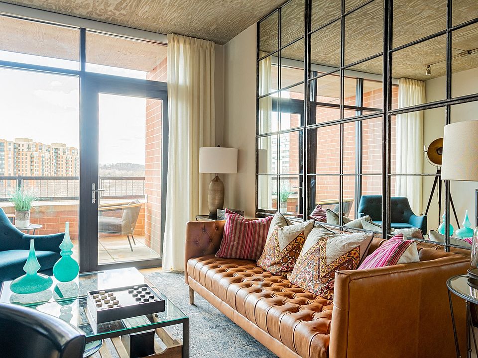 Floor-to-ceiling windows provide ample natural light