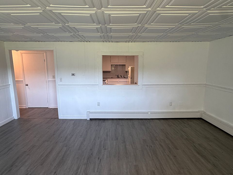 Living room looking into kitchen