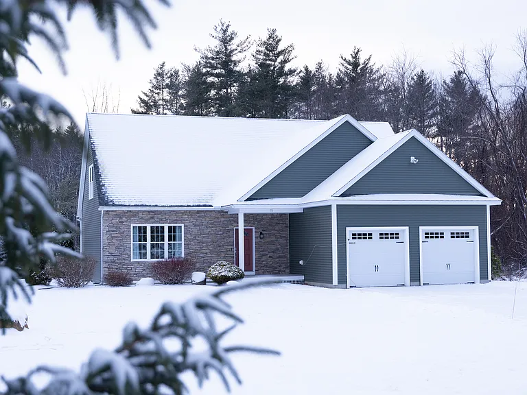 Front of the House in the Winter, and Two-Car Attached Garage