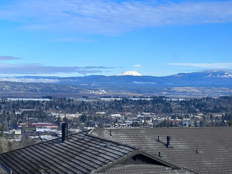 View to Mt. Saint Helens and the Columbia River from the primary bedroom, second bedroom, and bath