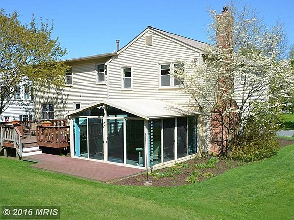Rear Deck / Sunroom Integrating the Great Outdoors