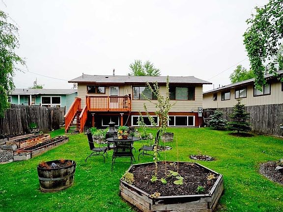 Beautiful back yard with apple tree!