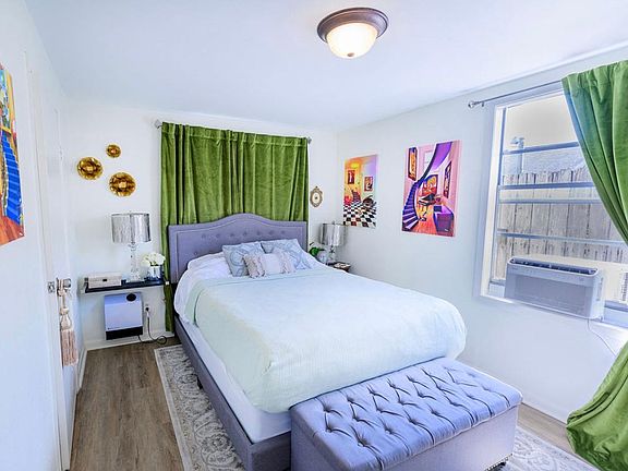 Shown furnished with queen bed for scale.