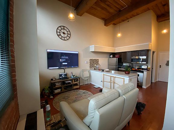 Smart TV (70_) on wall, Dishwasher, garbage disposal and microwave, Beautiful Haywood floor and high ceilings