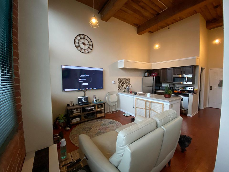 Smart TV (70_) on wall, Dishwasher, garbage disposal and microwave, Beautiful Haywood floor and high ceilings