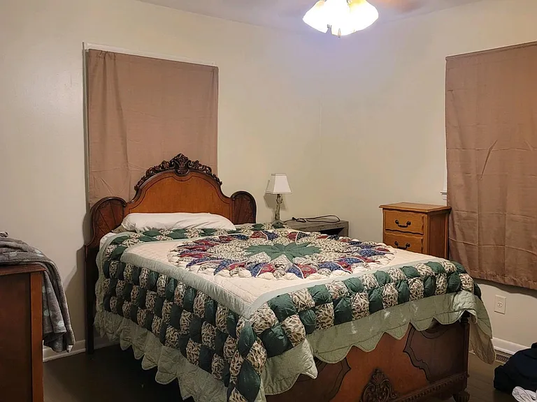 Master bedroom with ceiling fan