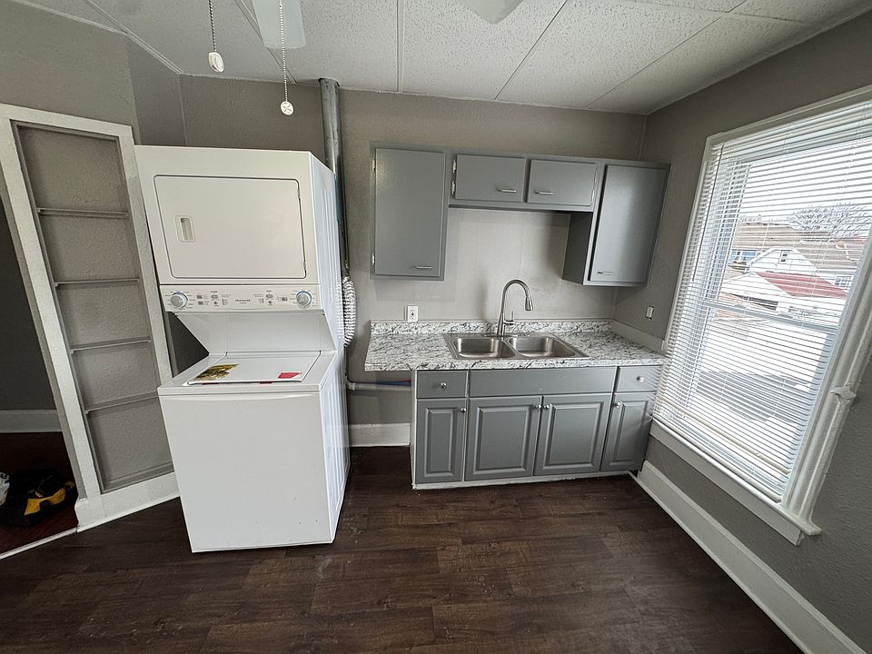 updated kitchen appliances incld stack washer dryer, stove and refrigerator