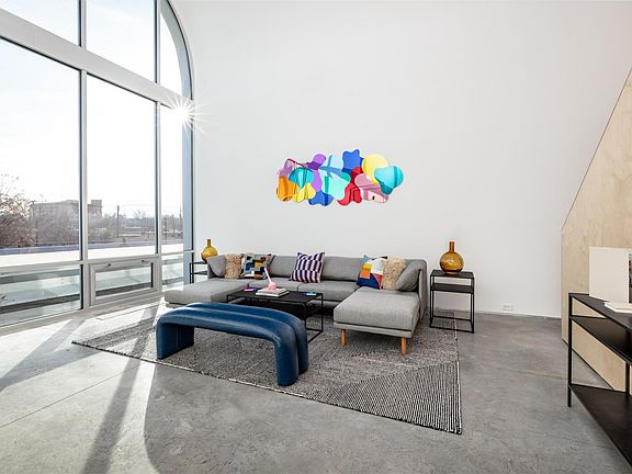 Living Room featuring custom artwork - privacy shade available
