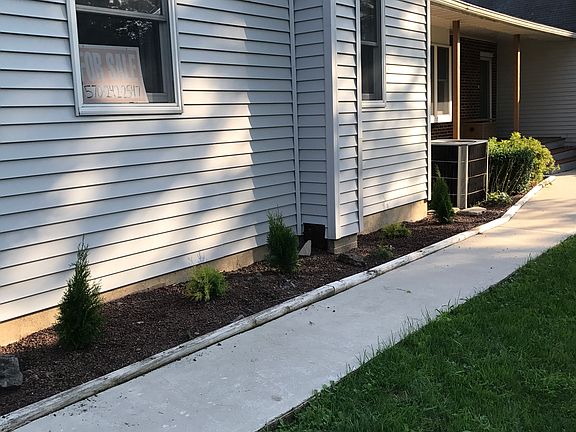 front sidewalk/new shrubs