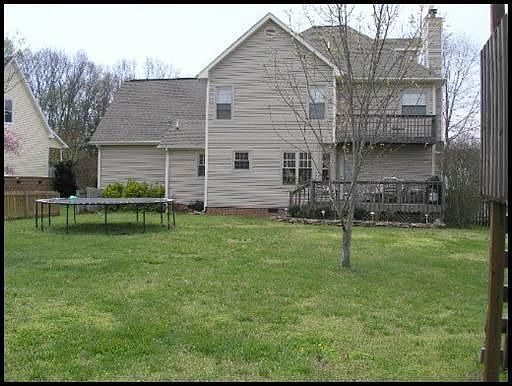 huge, level fenced back