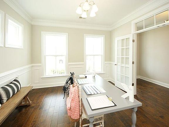Photos are of a similar home