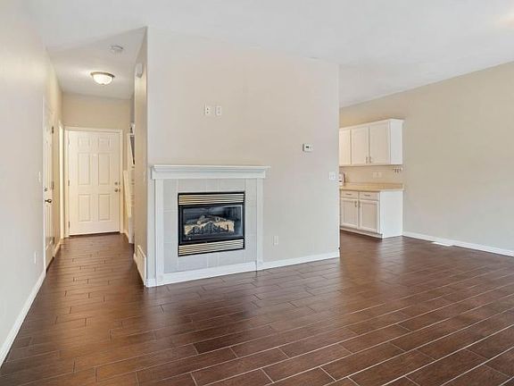 Large and open family room and kitchen. Gas fireplace.