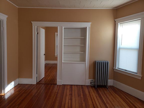 3rd floor common area with built-in bookshelf