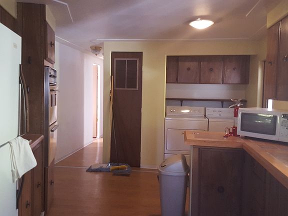 laundry area with built in storage