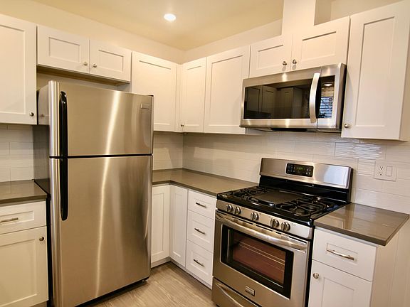 Updated, modern kitchen with stainless steel appliances