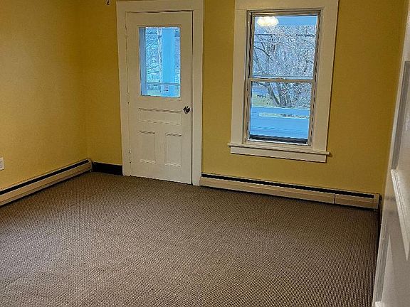 Large bedroom with balcony.