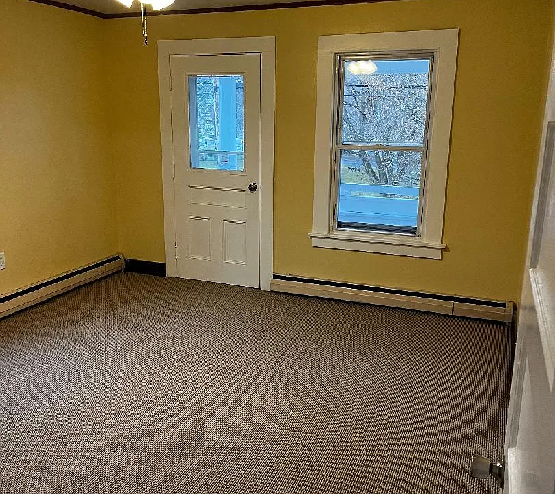 Large bedroom with balcony.