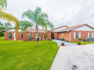 1928 N Spruce Creek Cir, Pt Orange, FL 32128