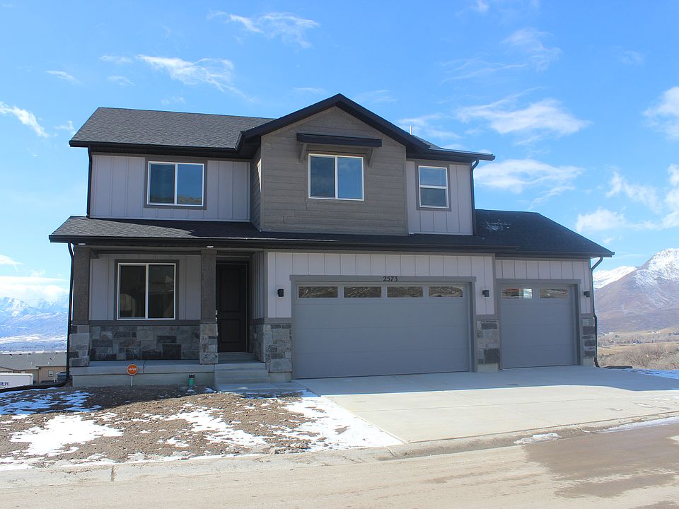 Front of the home. Corner lot with stunning mountain views.