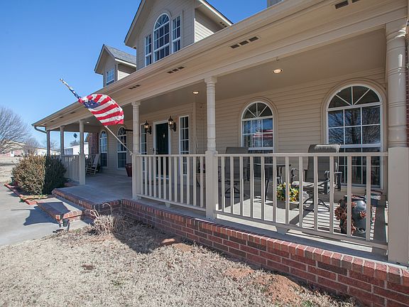 Large covered porch length of house