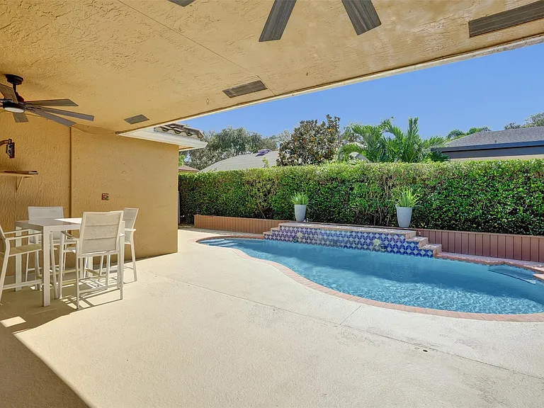 4142 NW 58th Dr — Photo 57