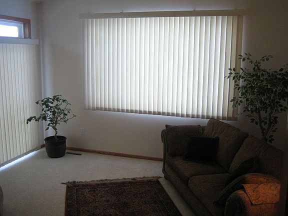 Four season porch with large windows overlooks the protected wetlands...it's beautiful!