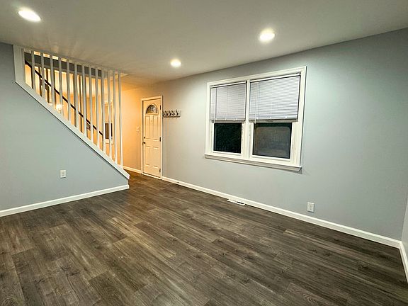 Spacious living room upon entry
