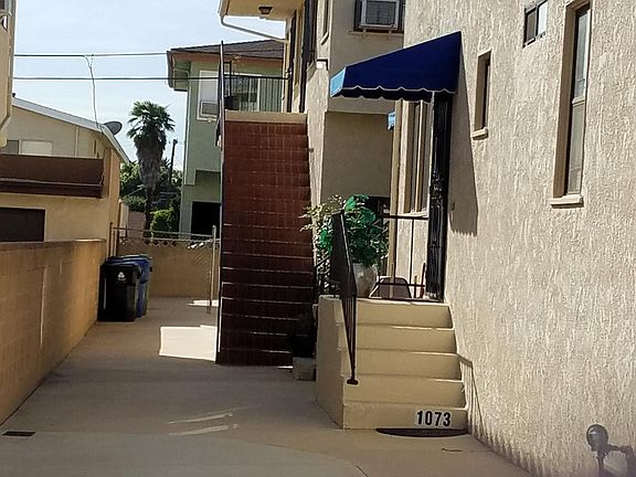 Walkway to apartment stairs