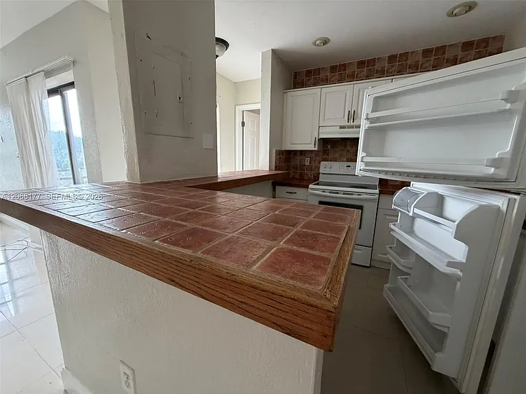 17650 NW 68th Ave #A2008 — Photo 13
