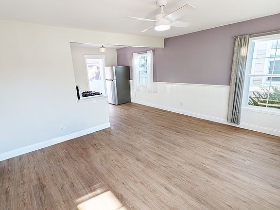 Living Space - includes ceiling fan, mini-split A/C and heat, beautiful wainscotting, hard floors, easy-open windows.