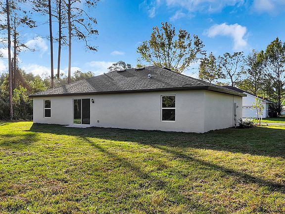 Enjoy a sliding glass door that opens the family room up to the backyard