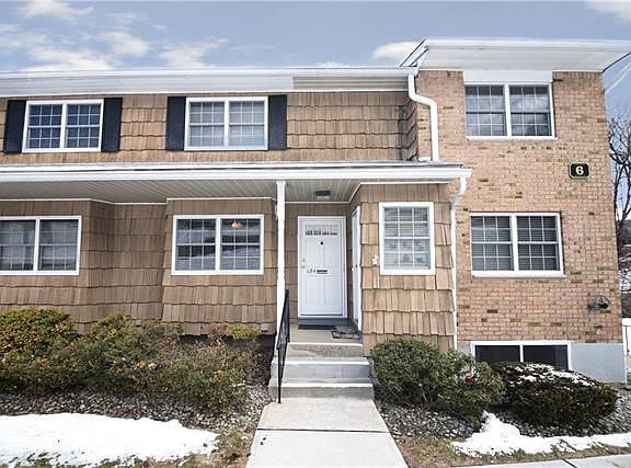 View of the front door to the spacious two bedroom first floor unit.