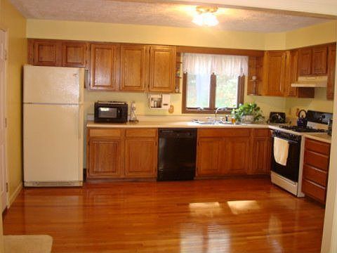 New wood floors in kitchen + dining room.