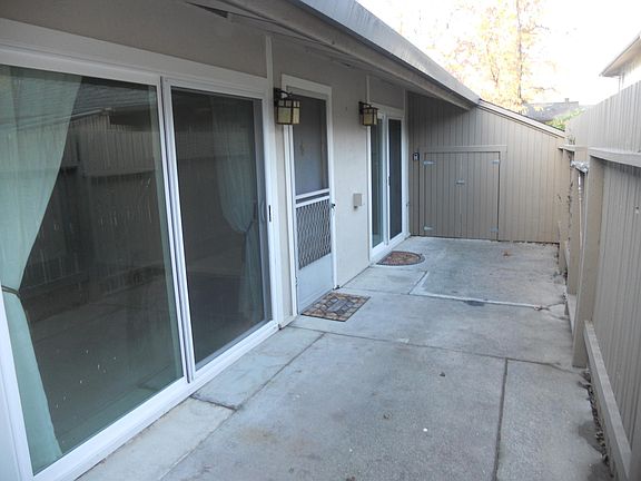 Front Patio sliding door to Living Area & Master Bedroom Storage at the end