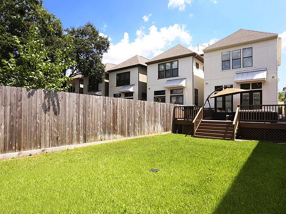 This private, lush backyard is the perfect combination for play and entertaining.