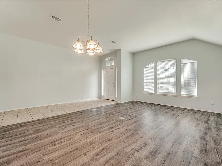 Front door opens to living and dining area