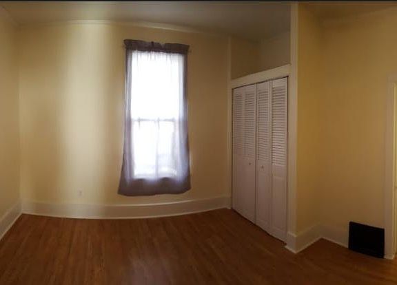 Front bedroom, off of living room, has entrance into the bathroom.