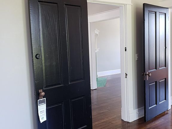 Brass door hardware restored and original to the house