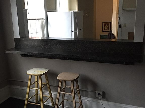 Bar in living room looking into Kitchen