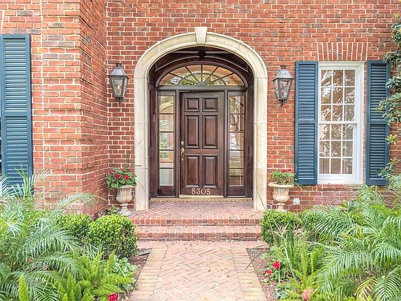 Stately arched front entry.