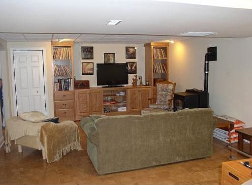 Finished basement with built in oak entertainment ctr