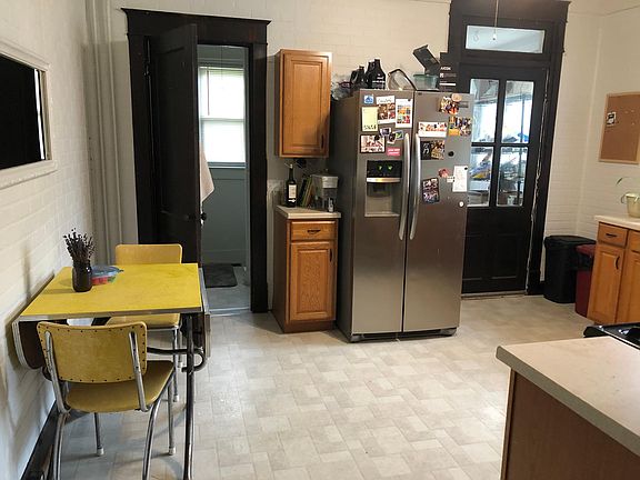 Updated kitchen includes stainless appliances. 1 Full bath on the main level and an enclosed mudroom leads to the fenced backyard.