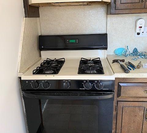 New stove and hood is being installed.