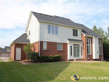 Huge back yard with brick patio