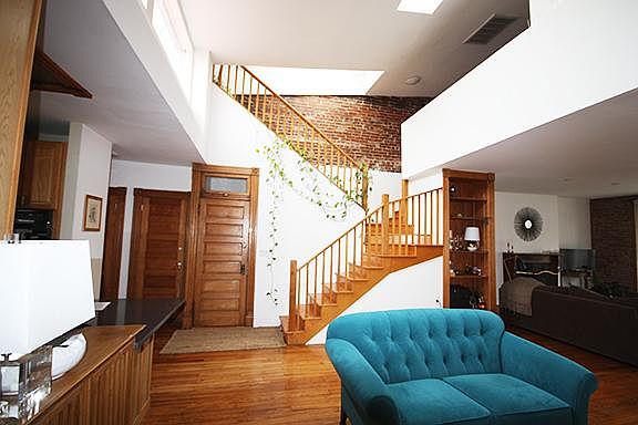 Middle room looking towards entrance and upper floor